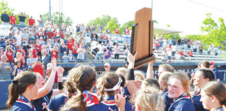 
			
				                                Pittston Area softball players celebrate with the state championship trophy — the first won by the school in any team sport — after defeating Armstrong in Thursday’s PIAA Class 5A finals at Penn State.
                                 Tony Callaio | For Sunday Dispatch

			
		