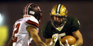 
			
				                                Wyoming Area running back Aaron Crossley puts a shoulder down against North Pocono defensive back Chase Zimmerman in Friday’s District 2 Class 4A quarterfinal. Crossley went over 200 yards rushing in the win.
                                 Fred Adams | For Times Leader

			
		