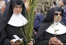 
			
				                                Nuns wait for the start of the Palm Sunday’s mass celebrate by pope Francis in St. Peter’s Square at The Vatican on Sunday, April 2, 2023. Palm Sunday will be celebrated today by Christians worldwide. It commemorates the Christian belief in the triumphant entry of Jesus into Jerusalem, when palm branches were strewn before him. It marks the start of Holy Week.
                                 AP File Photo

			
		