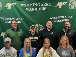
			
				                                Wyoming Area conducted a signing ceremony to celebrate Morgan Slusser’s commitment to play National Collegiate Athletic Association Division III women’s tennis at Misericordia University. Seated, from left: Gary Slusser, Kaitlyn Slusser, Morgan Slusser and Sherri Slusser. Standing, same order: Dr. Jon Pollard, Wyoming Area superintendent; Bill Roberts, head coach; Eric Speece, high school principal and Joe Pizano, athletic director.
 
			
		