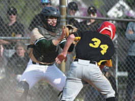 
			
				                                Wyoming Area catcher Jeremy Layland is about to put the tag on Lake-Lehman’s Andrew Mathis before he slides at home.
                                 Tony Callaio | For Sunday Dispatch

			
		