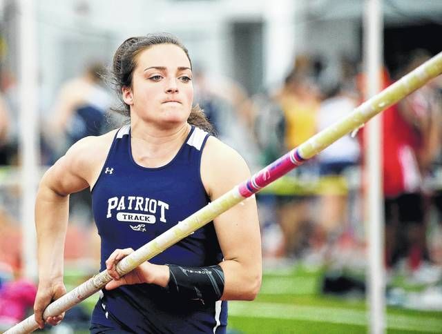 Pole vaulting serves as bonding activity between junior Abby Phillips and  new coach Todd Phillips – Mill Valley News