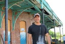 
			
				                                Developer George Albert stands outside the former Central Railroad of New Jersey train station in Wilkes-Barre last July as a community cleanup of the 1869 structure was getting underway.
                                 Times Leader file photo

			
		