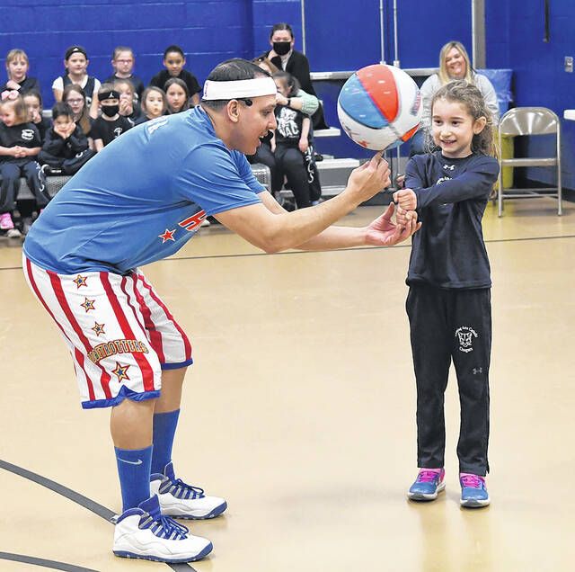 

<p>Former Harlem Globetrotter Blenda Rodriguez helps sophomore Madison Marsh learn how to spin a basketball on an ink pen.</p>
<p>Tony Callaio |  For Sunday Shipping</p>
<p>” srcset=”https://s24530.pcdn.co/wp-content/uploads/2022/03/128343392_web1_WAC-Harlem-Globetrotter-2.jpg.optimal.jpg” sizes=”(-webkit-min-device-pixel -ratio: 2) 1280px, (min-resolution: 192dpi) 1280px, 640px” class=”entry-thumb td-animation-stack-type0-3″ style=”float:left;  width:200px;  margin:3px;”/><br />
					<br />
					<small class=