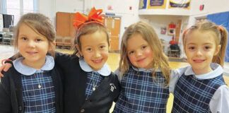 
			
				                                Kindergarten students Stella Dailey, Cheyenne Chofey, Karsyn Szumski, and Riley Ruda dress in orange on “The Lorax” day.
 
			
		